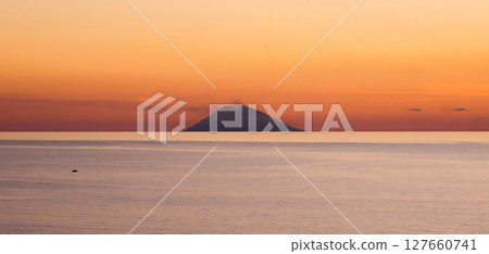 Stromboli Volcano Erupting at Sunset seen from Tropea, Calabria, Italy Stromboli Volcano Erupting at Sunset seen from Tropea, Calabria, Italy 127660741