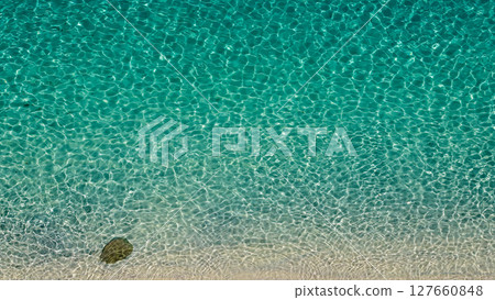 Crystal clear turquoise water gently washing the white sandy beach of Tropea, Calabria, Italy Crystal clear turquoise water gently washing the white sandy beach of Tropea, Calabria, Italy 127660848