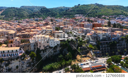 Tropea, Italy, aerial view of colorful houses on cliff overlooking Tyrrhenian Sea in Calabria Tropea, Italy, aerial view of colorful houses on cliff overlooking Tyrrhenian Sea in Calabria 127660886