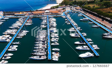 Modern marina with floating docks and many boats moored in Tropea, Calabria, southern Italy 127660887