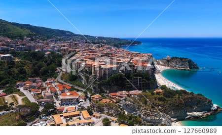 Tropea rising from the Tyrrhenian Sea in Calabria, Italy, aerial view of cityscape on cliff Tropea rising from the Tyrrhenian Sea in Calabria, Italy, aerial view of cityscape on cliff 127660989