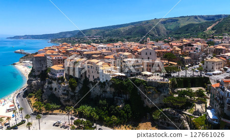 Tropea, Italy, aerial view of picturesque cliffside town overlooking turquoise Tyrrhenian Sea Tropea, Italy, aerial view of picturesque cliffside town overlooking turquoise Tyrrhenian Sea 127661026