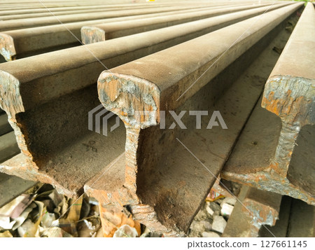 Railway track material steel image with selective focus Railway track material steel image with selective focus 127661145
