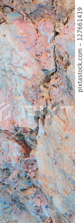 Detail shot of arid and eroded rocks showing cracked stones and rustic textures. Detail shot of arid and eroded rocks showing cracked stones and rustic textures. 127661419