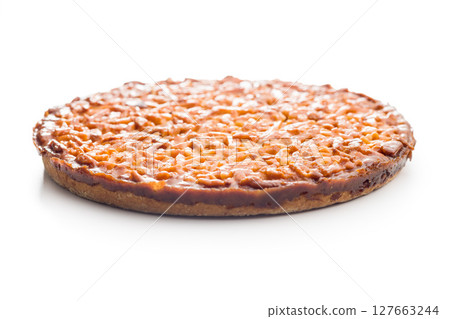 Sweet almond pie isolated on white background. 127663244