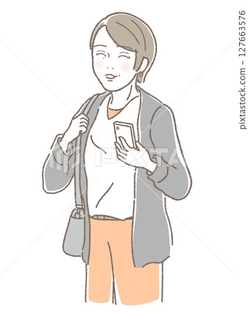 Smiling middle-aged woman holding a smartphone Smiling middle-aged woman holding a smartphone 127663576