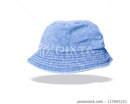 Blue bucket hat floating on white background. 127665231
