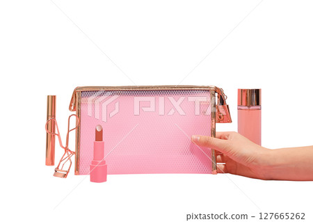 Pink makeup bag with items in hand, isolated on white, PNG 127665262
