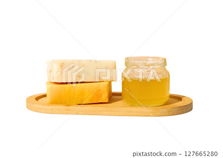 Two soap bars and a jar of honey on a tray, isolated on white, PNG Two soap bars and a jar of honey on a tray, isolated on white, PNG 127665280