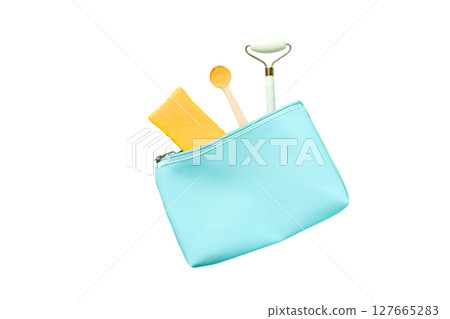 Beauty tools in a blue pouch, isolated on white, PNG 127665283