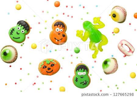 Bright Halloween treats and decor, isolated on white, PNG 127665298