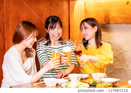 Women's party: Women toasting with various drinks Women's party: Women toasting with various drinks 127665528