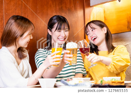 Women's party: Women toasting with various drinks Women's party: Women toasting with various drinks 127665535