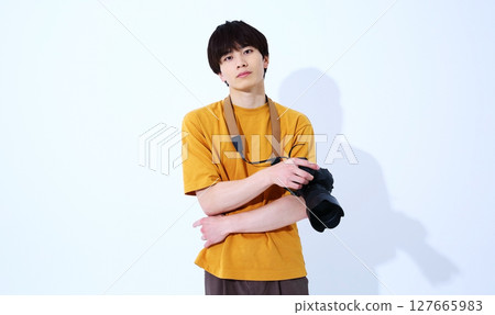 Image of a male photographer Image of a male photographer 127665983