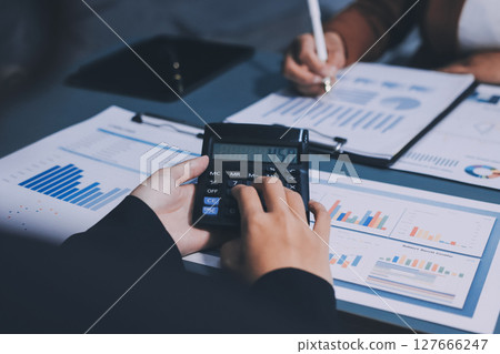 Business Documents, Auditor businesswoman checking searching document legal prepare paperwork or report for analysis TAX time,accountant Documents data contract partner deal in workplace office 127666247