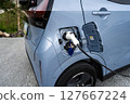 Charging an electric car 127667224