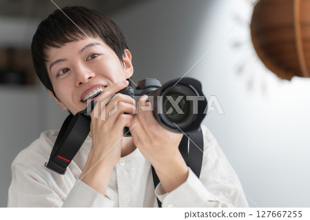 Photographer shooting studio Photographer shooting studio 127667255