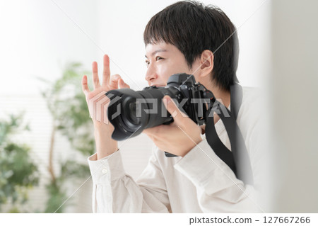 Photographer shooting studio Photographer shooting studio 127667266
