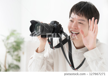 Photographer shooting studio Photographer shooting studio 127667271