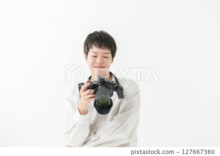 Photographer shooting studio Photographer shooting studio 127667360