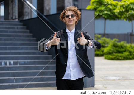 Caucasian business man happy successful satisfied businessman showing thumb up like recommend sign Caucasian business man happy successful satisfied businessman showing thumb up like recommend sign 127667367