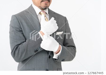 Man wearing gloves, hands Man wearing gloves, hands 127667445