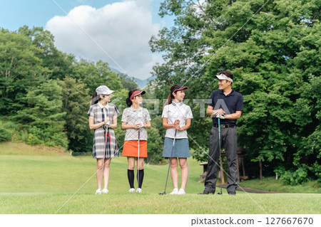 Men and women who came to golf, golf school, golf lessons, teachers and students who play golf classes Men and women who came to golf, golf school, golf lessons, teachers and students who play golf classes 127667670