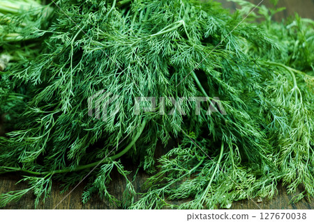 Fresh Dill Leaves (Suva Bhaji) on the wooden table 127670038