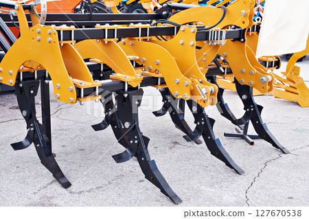 Universal agricultural cultivator at exhibition 127670538