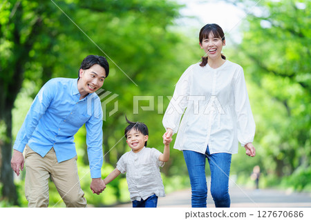 Families walking hand in hand 127670686