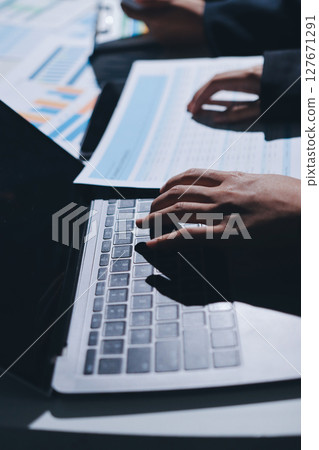 Two business people analyzing the data 127671291