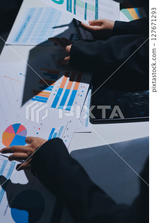 Two business people analyzing the data 127671293
