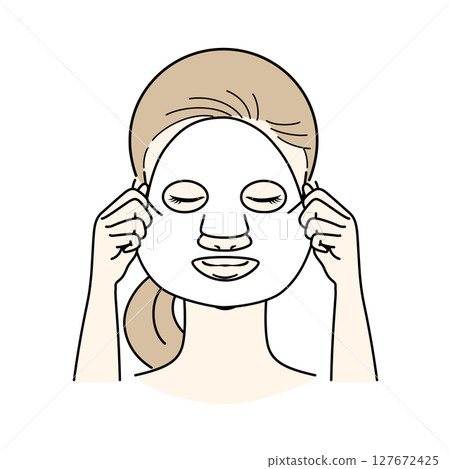 Long-haired woman doing skin care face pack 127672425