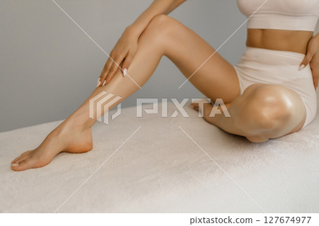 Wellness and beauty concept, beautiful slim woman in white underwear  127674977