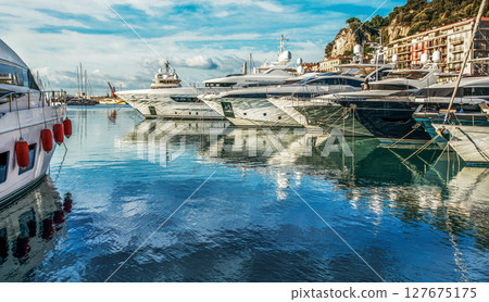 Fantastic view on noses of luxury motor yachts at Lympia port or port Hercule or Vieux port de Marseille Fantastic view on noses of luxury motor yachts at Lympia port or port Hercule or Vieux port de Marseille 127675175