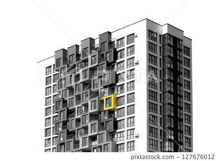 Apartment building in monochrome with one yellow window highlighted. Concept of individuality, Apartment building in monochrome with one yellow window highlighted. Concept of individuality, 127676012