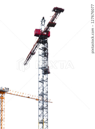Defocused silhouette of construction crane and building against sky. Abstract urban concept 127676077