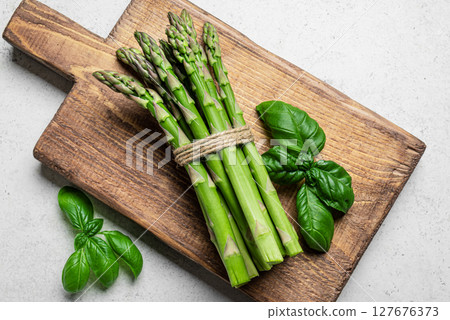 Bunch of green asparagus 127676373