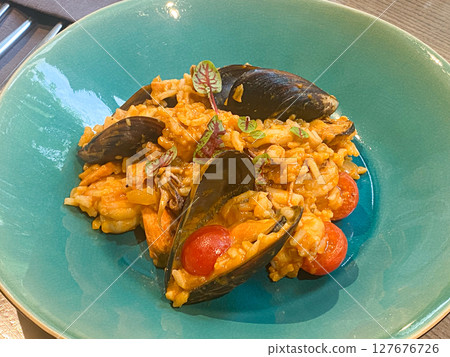 Traditional Portuguese Paella with Seafood and Local Ingredients. 127676726