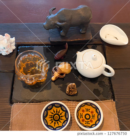 Traditional Tea Ceremony with Elegant Serving Ritual. Traditional Tea Ceremony with Elegant Serving Ritual. 127676730