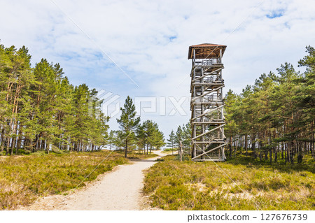Kolkasrags wooden bird watching tower along sandy forest trail on Latvia Baltic coast 127676739