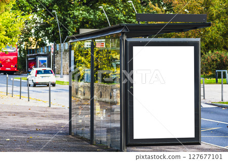 Bus stop mockup on sunny day, urban scene 127677101