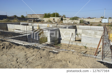 construction of the foundation of a new residential building construction of the foundation of a new residential building 127677364