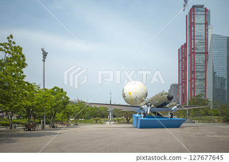 Propeller plane inside a building Propeller plane inside a building 127677645