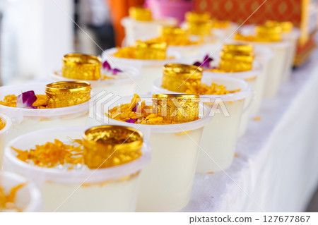 Golden color bowl and flowers. Equipment prepared for Water Festival in Thailand. 127677867