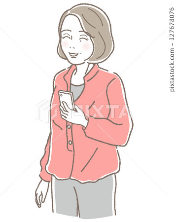Smiling middle-aged woman holding a smartphone 127678076