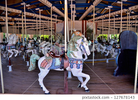 A quiet merry-go-round undergoing maintenance 127678143