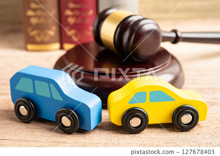 Hammer gavel judge with car vehicle accident, insurance coverage claim lawsuit court case. Hammer gavel judge with car vehicle accident, insurance coverage claim lawsuit court case. 127678403