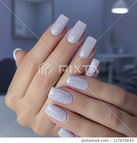 Nail extensions, manicure, nail correction, hands in the foreground gel polishes Nail extensions, manicure, nail correction, hands in the foreground gel polishes 127678643