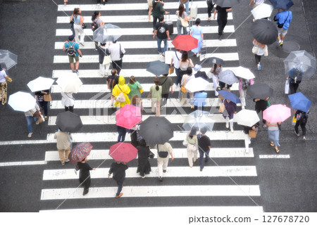 People walking at Ginza 4-Chome intersection in the pedestrian precinct 127678720